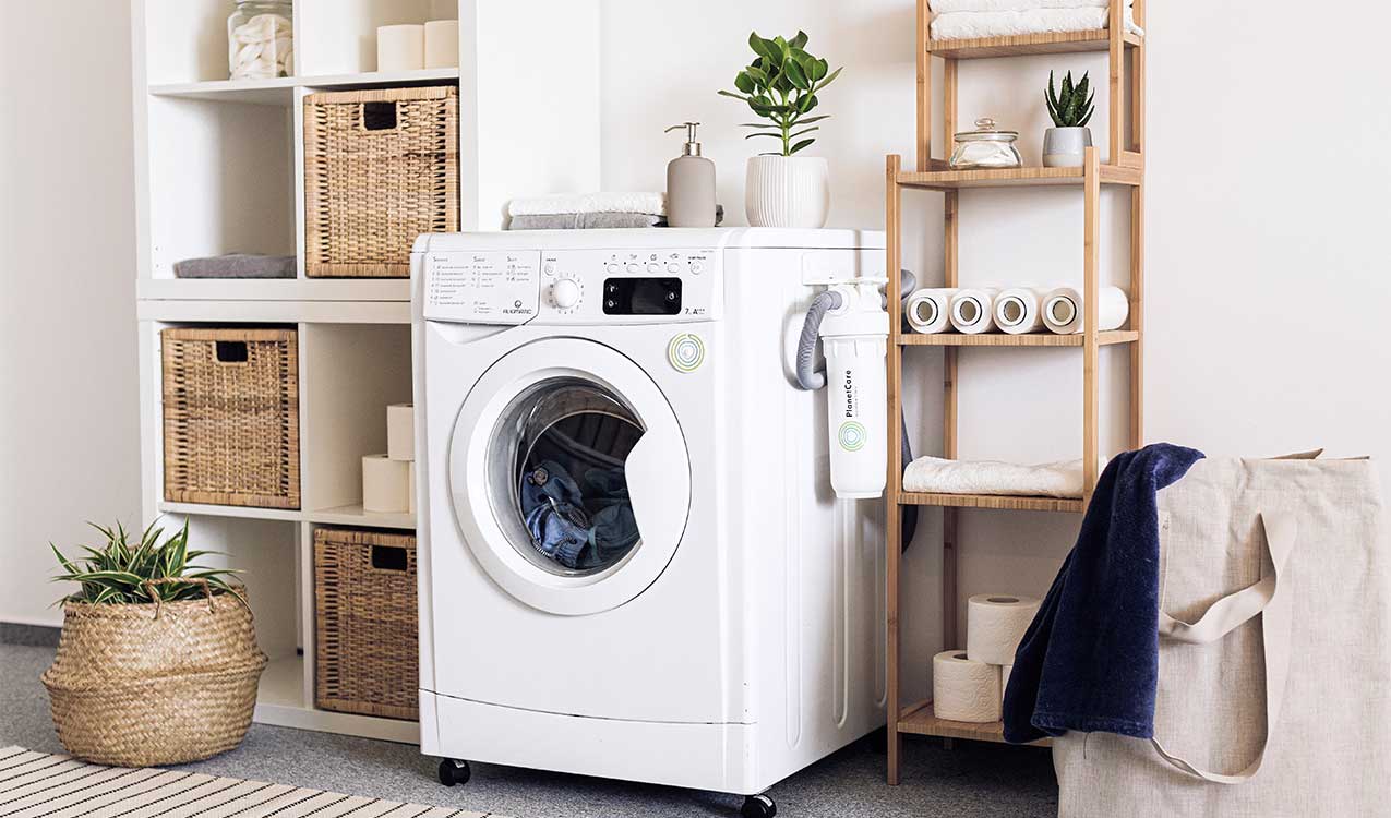 decluttered-laundry-room-with-washer-dryer-combo | Adept Organizer