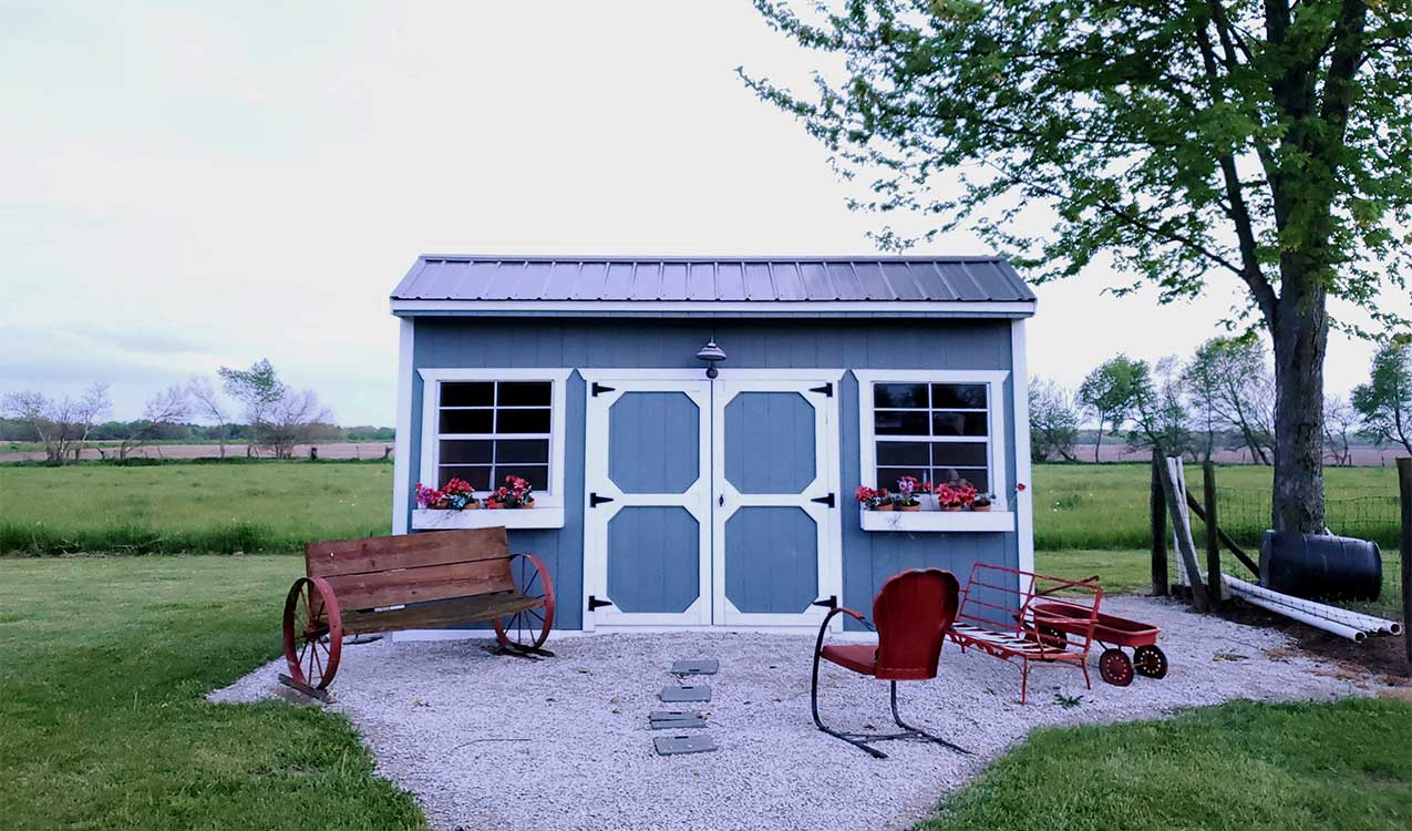 blue-white-shed-featuring-old-style-crate-benches | Adept Organizer