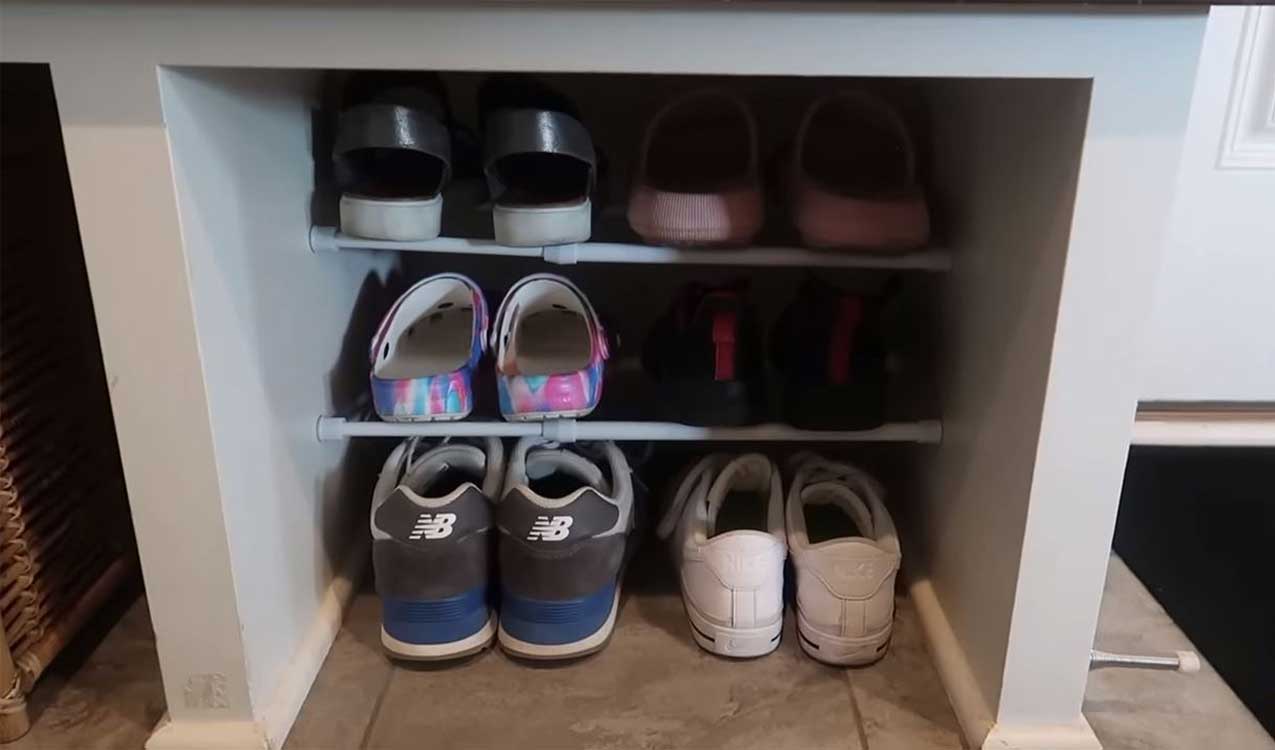 home-organization-cleaning-hacks-organized-shoes-with-tension-rods